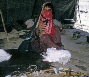 Nomad woman in tent Afghan nomad woman with baby