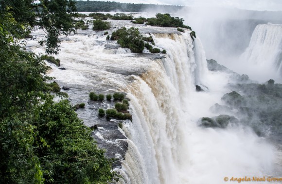 Devils Throat at the end of the falls where water thunders 300 meters over a precipice causing huge spray and mist | Photo: Angela Neal Grove