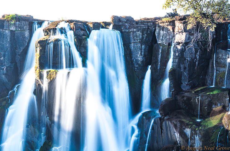 Victoria Falls Smoke That Thunders; Close up of the water cascading down the precipice . Taken in late afternoon