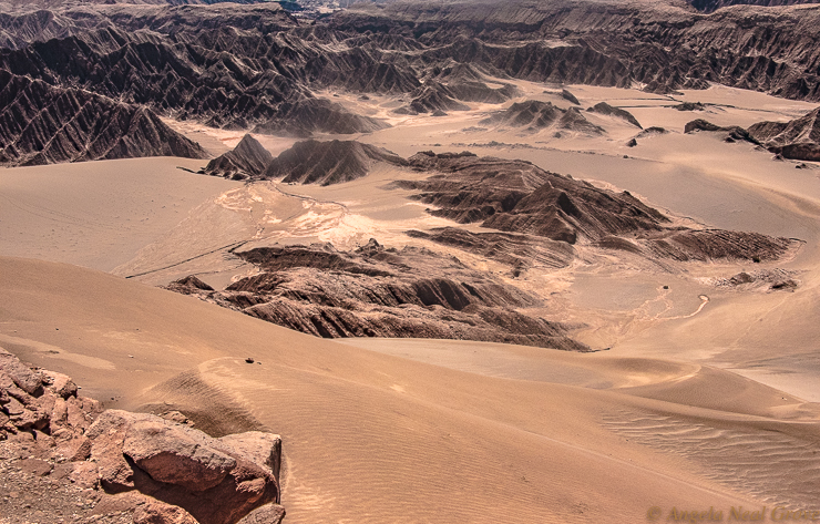 Otherworldly Atacama Desert. Valley of the Moon near San Pedro de Atacama. This luna landscape has wavelike ridges of rock which have been sculpted into peaks by sand and wind. PHOTO; ANGROVE