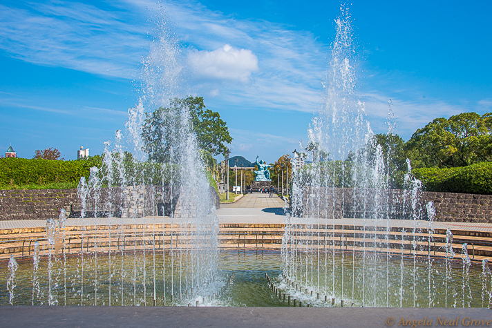 The Nagasaki Peace Park is adjacent to the Bomb Museum. There is sculpture given by nations across the world to promote peace. Above is the central fountain shaped like wings of a dove. In the distance is the peace statue created by Japanese sculptor, Seibo Kitamura. PHOTO; ANGROVE