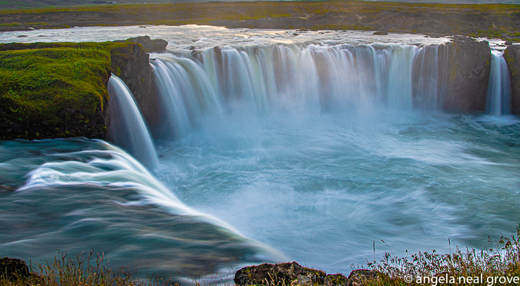 Godafoss Waterfall is one of the most iconic in Iceland - in a land of waterfalls. Here, this horseshoe fall glitters in the evening light. Iceland is a land of contrasts. //: PHOTO: A.N GROVE